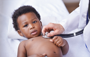 Image showing Baby, portrait and pediatrician with stethoscope consultation or lung infection or diagnosis, heartbeat or listening. Child, boy and face on hospital bed or healthcare checkup in Kenya, clinic or ill