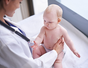 Image showing Baby, pediatrician and stethoscope for heartbeat consultation or lung infection, examination or checkup. Child, boy and hospital bed or healthcare wellness clinic for diagnosis, sickness or results