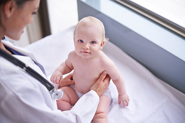 Image showing Clinic, pediatrician and woman with baby, medical and checkup with wellness, consultation and doctor. Hospital, professional and employee with healthcare and infant with appointment and medicare