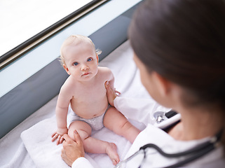 Image showing Baby, portrait and pediatrician consultation for healthcare checkup on hospital bed for diagnosis, insurance or childcare. Kid, face and medical worker for sick treatment, examination or stethoscope