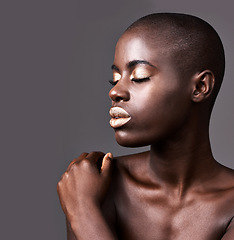 Image showing Face, mockup and closeup of black woman for makeup, beauty and cosmetics isolated on gray background. Person, African lady and eyeshadow with lipstick in studio for skin care, cleansing or treatment