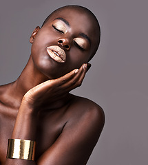 Image showing Jewelry, face and closeup of black woman for makeup, beauty or cosmetics isolated on gray background. Person, African lady or eyeshadow with lipstick in studio for skin care, dermatology or treatment