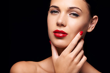 Image showing Cosmetics, manicure and portrait of woman in studio with trendy, beauty and face routine with red lips. Makeup, nail polish and female model with facial cosmetology treatment by black background.