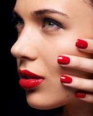 Image showing Makeup, manicure and face of woman in studio with trendy, beauty and facial routine with red lips. Cosmetics, nail polish and female model with cosmetology treatment by dark black background.