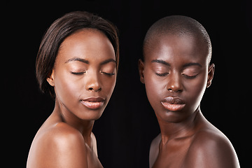 Image showing Studio, skin care and wellness of friends, cosmetics and foundation on black background. Sisterhood, African women and together for dermatology or facial treatment, confidence and proud of glow