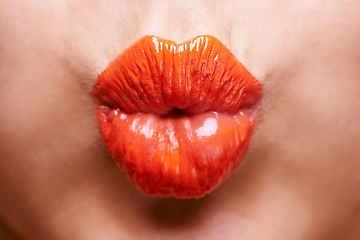 Image showing Lipstick, beauty and mouth of woman with kiss for makeup, cosmetics and products on background. Salon, cosmetology and pout closeup of person with lip gloss, shine and creative aesthetic in studio