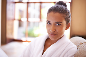 Image showing Spa, portrait and woman with wellness, relax and vacation with getaway trip and adventure. Person, hospitality and girl with luxury or bathrobe with aesthetic or skincare with holiday, peace or hotel