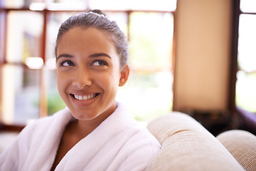 Image showing Spa, thinking and woman with smile, wellness and vacation with getaway trip and luxury hotel. Person, hospitality industry and girl with peace and bathrobe with relax and skincare with holiday