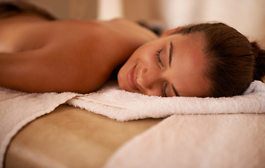 Image showing Peace, calm and woman in spa to relax for vitality or wellbeing, luxury and pamper for body care or treatment. Female person, resort and carefree after massage therapy for wellness and relaxation.