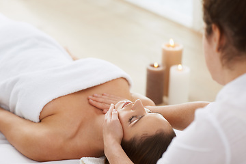 Image showing Woman, massage and physical therapy or relax spa treatment at holiday resort or luxury care, service or stress relief. Female person, masseuse and candles for calm vacation, comfortable or skincare