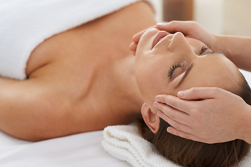 Image showing Woman, hands and facial massage for treatment to relax, cosmetics and beauty therapy for skin care. Female person, calm and serene or dermatology, closeup and rest at hotel and peace or pampering