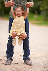 Image showing Father, child and lifting fun for outdoor connection on holiday or parent bonding or vacation, games or adventure. Male person and daughter happiness in Australia for playing travel, nature or summer