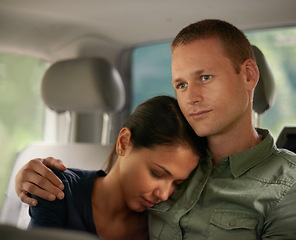 Image showing Love, taxi and couple hug in a car with trust, support and safety, peace and bonding on commute. Travel, passenger and people embrace on a backseat of cab, transport or journey on chauffeur service