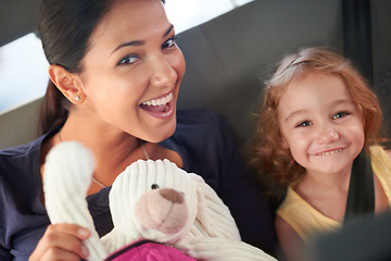 Image showing Taxi, portrait or mother and daughter in a car for adventure, road trip or bonding with teddy bear games. Love, family and kid with mom in a backseat of cab with care, trust and safety, travel or fun