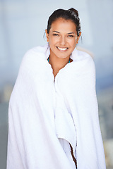 Image showing Towel, smile and woman with portrait, dry and getaway trip with holiday and traveling. Person, cloth or girl with happy and freedom with summer or weekend break with morning routine and covering body