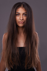 Image showing Portrait, woman or messy hair for haircare, beauty or texture change for growth, health or scalp in studio. Female model, damaged or long as haircut, weak or split end in treatment on grey background