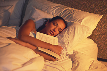 Image showing Woman, sleep and book in room and light, dreaming female person or night lamp for story and novel. Relax, hobby and tired girl with fantasy or biography, literature or learning for peaceful rest