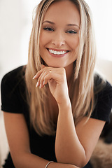 Image showing Portrait, happy woman and relax on break indoor, wellness and confidence of freelancer in home. Face, positive and blonde lady with rest in lounge, mindfulness and remote job for choice in apartment