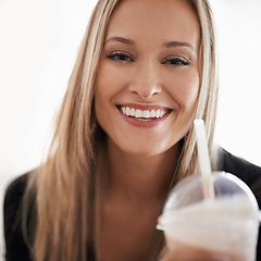 Image showing Portrait, happy woman and drinking a smoothie in home, wellness and wellness for break on weekend. Face, positive and healthy person with fruit cocktail on sofa, nutrition and vitamins in apartment