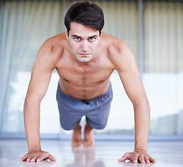 Image showing Portrait, fitness and man during push up, sports and working out at gym center. Exercise or plank for core muscle and health or well being for body, pilates and fit male sportsman at outdoor studio