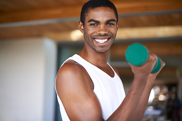 Image showing Black man, smile and training with dumbbell for exercise, bodybuilding and performance goals. African person, portrait and equipment with lifting weights for wellness, strength and healthy body