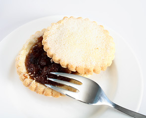 Image showing Open mince pie and fork
