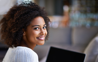 Image showing Portrait, smile and happy woman on laptop, online and living room of home. Technology, computer and internet shopping or ecommerce for retail, African female person and afro in lounge and relax