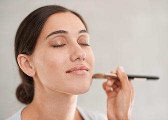 Image showing Beautician, client and makeup with brush beauty and cosmetics for special event in studio. Female person, face products and blush or eyeshadow for confidence, skincare or stylish in white background