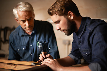 Image showing Man, dad and coach with wood, workshop and family business or apprenticeship. Father, adult son and design with artisan, carpentry and together for startup or mentor with learning and working