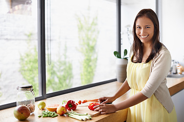 Image showing Happy woman, portrait and cutting with vegetables for natural nutrition, diet or preparing healthy food at home. Female person or vegetarian with smile for organic meal, salad or wellness in kitchen