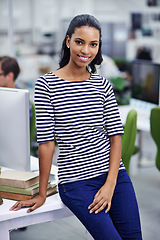 Image showing Woman, smile and portrait in office for business, fashion or style at workstation or headquarters. Intern, trainee or Journalist person and lean on desk for happy, casual or relax in South Africa