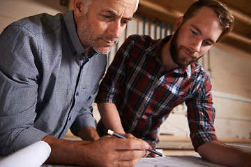 Image showing Teamwork, father and son in workshop, architect and pencil with drawing, documents and wood. Parent, men and renovation with construction and building with planning for project, startup and carpenter