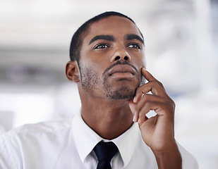 Image showing Businessman, thinking and planning for vision or ideas, startup and professional in formal clothes. Black man, corporate and thoughts in office or workstation, decision and salesman in workplace