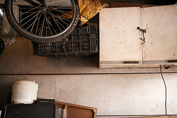 Image showing Storage, bicycle and tools in shed house with old wood interior and rust with trash. Home, garage and bike in slum with broken furniture or equipment in crates to store instruments in boxes.