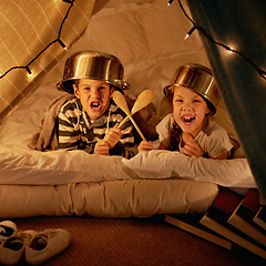 Image showing Children, siblings and portrait with pot, helmet or spoon in a fort for fantasy, learning or playing at home. Happy family, face or kids on a floor with tent games, development or bonding in a house