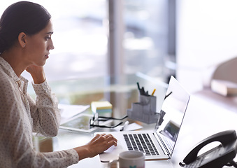 Image showing Businesswomen, laptop and working at office, desk and computer for corporate worker. Technology, online and concentrated female financial advisor, deadline and screen on table for budget and money