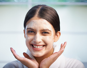 Image showing Skincare, clay and portrait of happy woman in face mask in bathroom for hydration at home. Smile, facial treatment and person with cosmetics for dermatology, wellness and cleansing skin for beauty