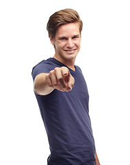 Image showing Portrait, man and pointing gesture isolated on studio background with happiness, confidence and smile. Male person, model and face for fashion, clothing and trendy style in fashionable choice