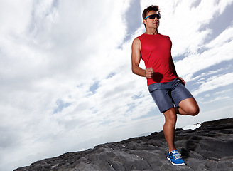 Image showing Athlete male person, running and outdoor for fitness, health and wellness in activewear and sunglasses. Man, jog and seaside for sport, train and gym in workout and exercise for cardio routine