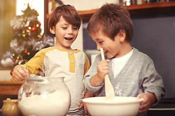 Image showing Boys, baking and happy in kitchen with flour, home and learning with ingredients for christmas cake. Children, mixing or bowl for cookies on counter, biscuits or pastry recipe for holiday celebration