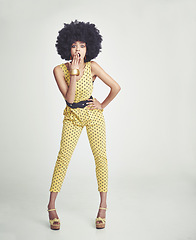 Image showing Black woman, surprise and afro with style in fashion, deal or special offer on a gray studio background. Portrait of young African, female person or retro model in shock or outfit on mockup space