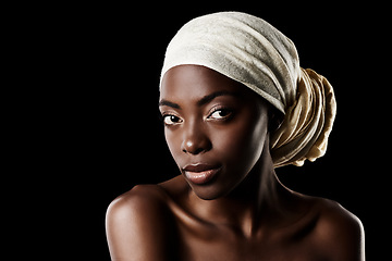 Image showing Glamour, portrait and black woman with head wrap, natural makeup and beauty aesthetic in studio mockup. Art, skincare and African girl on dark background with scarf, facial cosmetics and confidence.