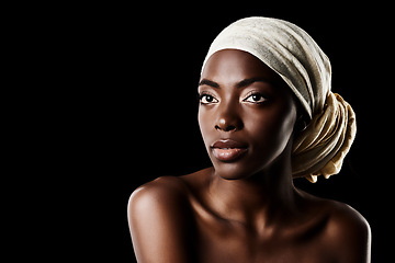 Image showing Beauty, glamour and black woman with head wrap, natural makeup or creative aesthetic in studio mockup. Art, skincare and African queen on dark background with scarf, facial cosmetics and confidence.