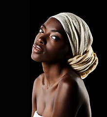 Image showing Beauty, confidence and portrait of black woman scarf, natural makeup or creative aesthetic in studio. Art, skincare and African girl on dark background with head wrap, facial cosmetics and pride.