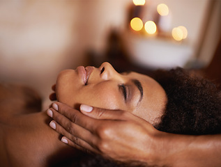 Image showing Black woman, closeup of hands on face and massage with masseuse, beauty and bodycare at spa for stress relief and wellness. Treatment, facial and healing for zen, self care and relax at luxury resort