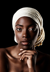 Image showing Beauty, portrait and black woman with head scarf, natural makeup or creative aesthetic in studio. Art, skincare and traditional African girl on dark background with wrap, face cosmetics or confidence