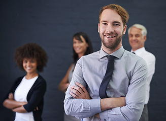 Image showing Business man, leadership and arms crossed in studio portrait for teamwork, confidence and about us on a wall background. Professional man, group and accountant with smile for company, job or career