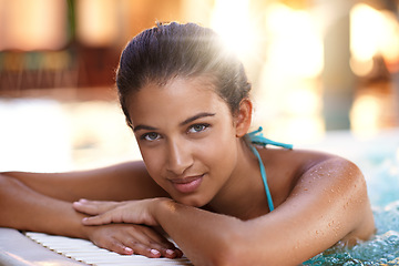 Image showing Happy woman, portrait and relax with water in jacuzzi for holiday, getaway or stress relief at hotel, resort or spa. Face of young female person with smile in hot tub, pool or treatment on vacation