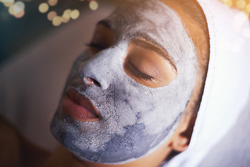 Image showing Woman, closeup of face with mask and beauty for skincare, charcoal or clay for treatment and dermatology at day spa. Detox for healthy skin, facial and cosmetics for self care with wellness