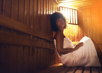 Image showing Black woman, relax in sauna and detox at spa for healing, self care with wellness and zen. Relax, calm and peace on pamper day with heat or warm body treatment, skincare and health with stress relief